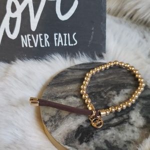 Adjustable Michael Kors gold beaded bracelet
